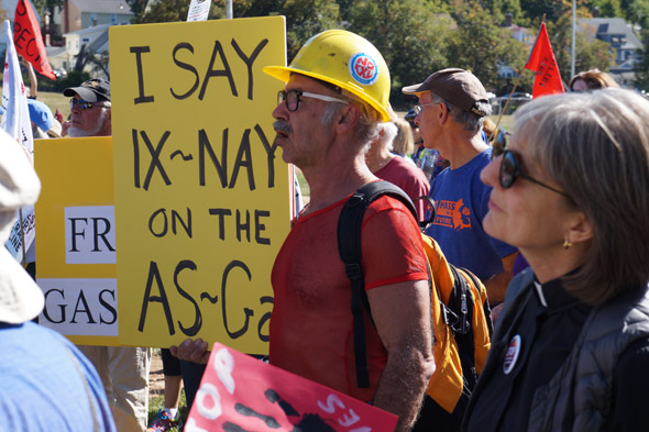 Pipeline protesters with simulated pipeline