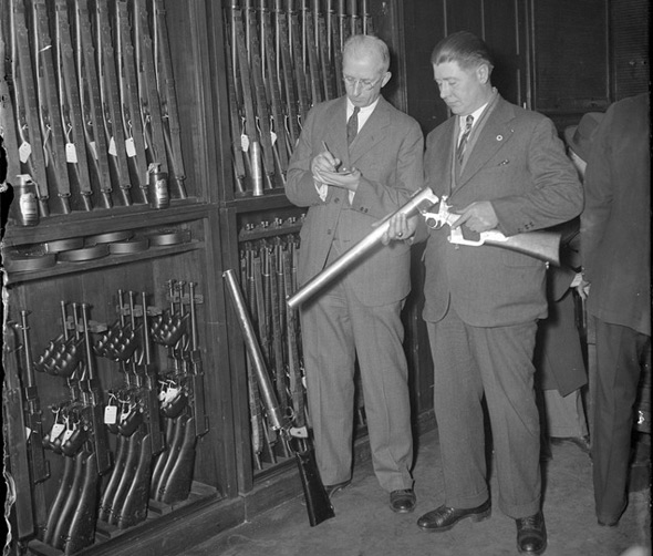 Boston officers with long guns