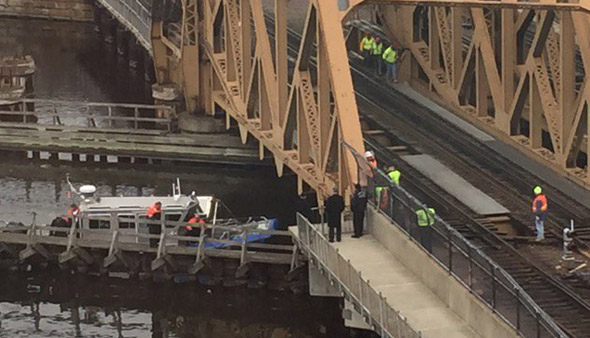 Divers going into Charles River