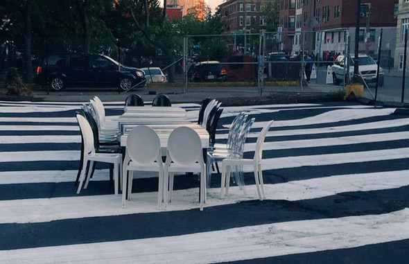 Tables in the old Burger King parking lot in the Fenway.