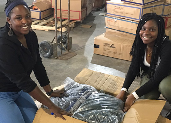 Packing up coats at BPS in the Bolling Building in Dudley Square