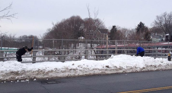 Shoveling out the Fairmount Avenue bridge in Hyde Park