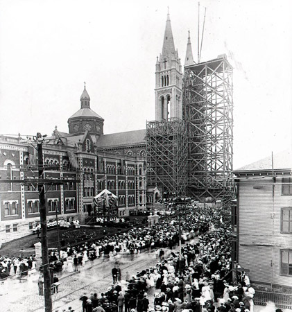 Church in old Boston with scaffolded steeples