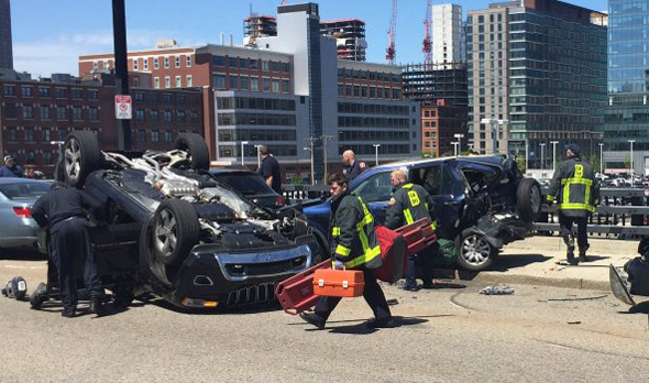 Flipped SUV on Summer Street in South Boston