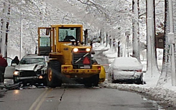 Plow smashes car