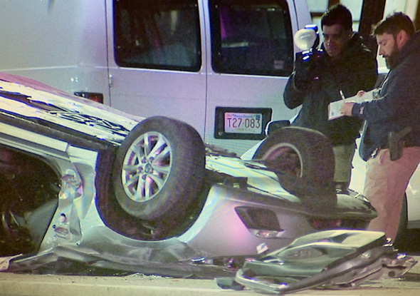 Investigators at East Boston crash scene