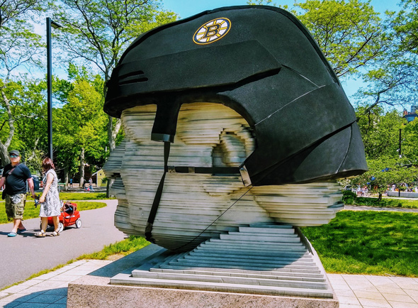 Giant Arthur Fiedler head with a Bruins helmet on