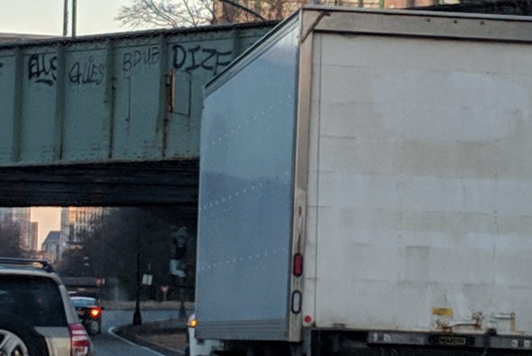 Box truck narrowly avoids storrowing