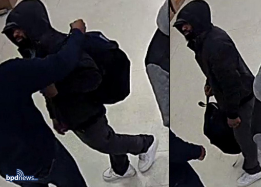 Wanted suspect in a hoodie, with backpack