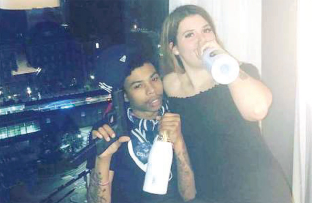 Couple with gun and Belaire champagne