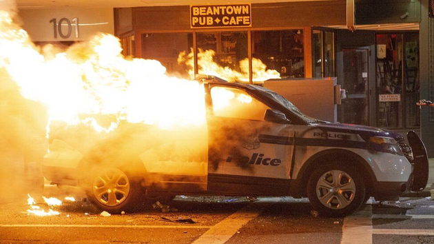 Boston Police cruiser on fire on Tremont Street.