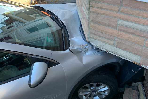 Car into London Street house, with parking ticket