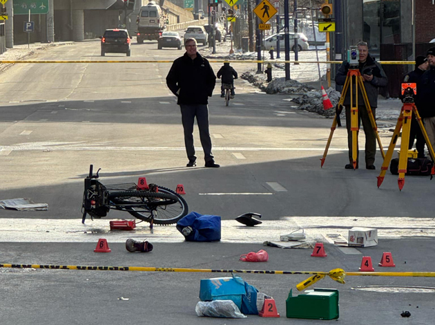 Investigators take photos at crash scence