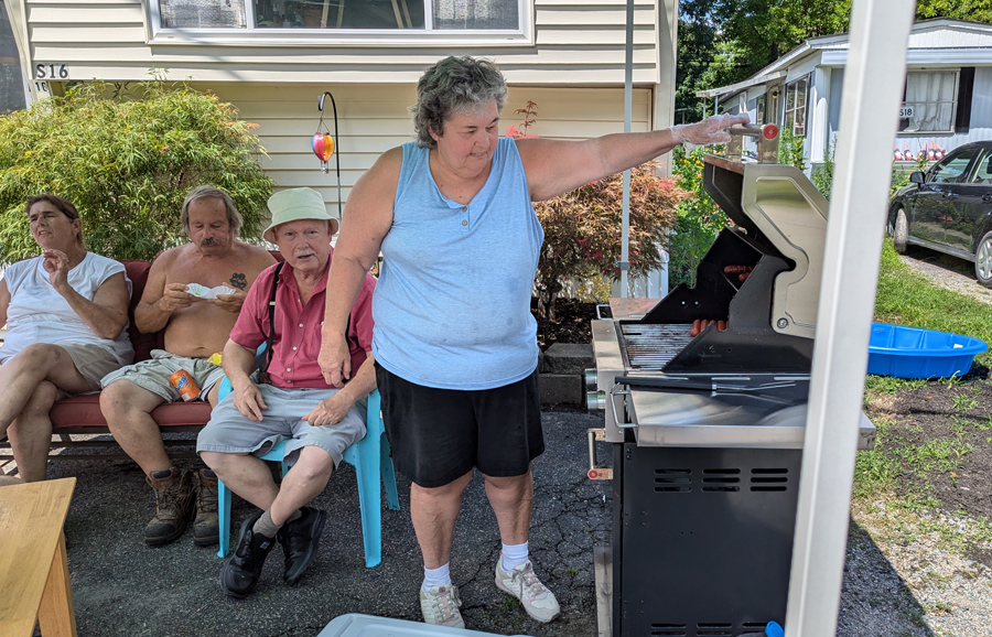 Donna Cabral grilling up some hot dogs