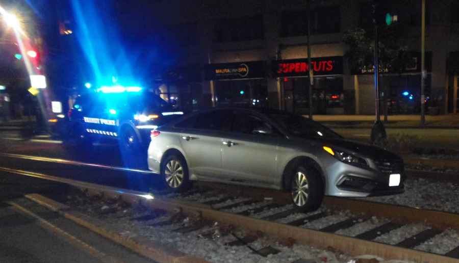 Car on the Green Line tracks at Fuller Street