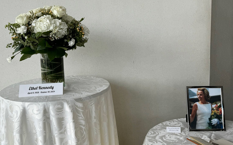 Flowers and picture in honor of Ethel Kennedy at the JFK Library