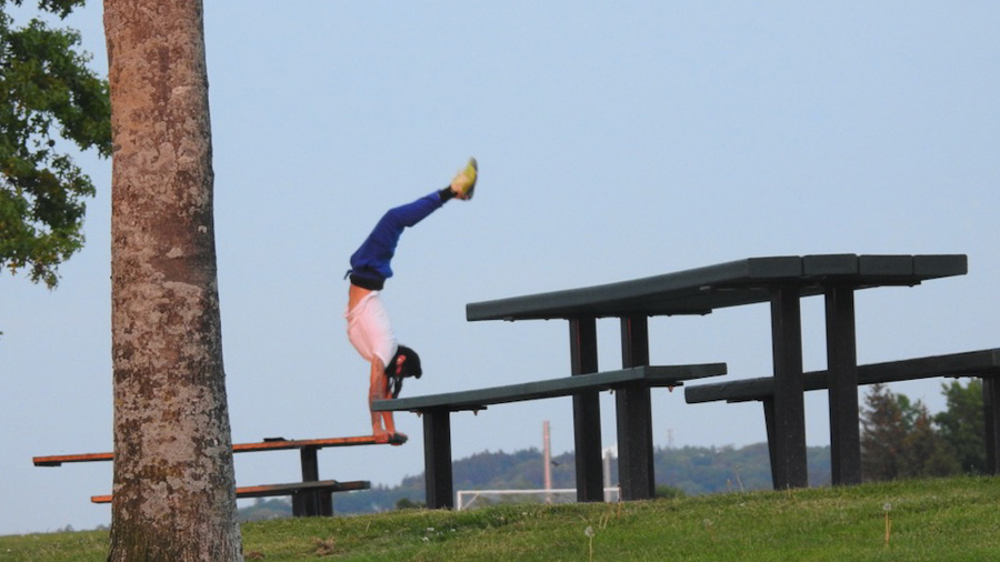 Acrobatics on a picnic bench at Millennium Park