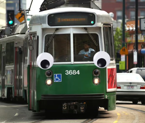 A hypothetical Green Line trolley with googly eyes