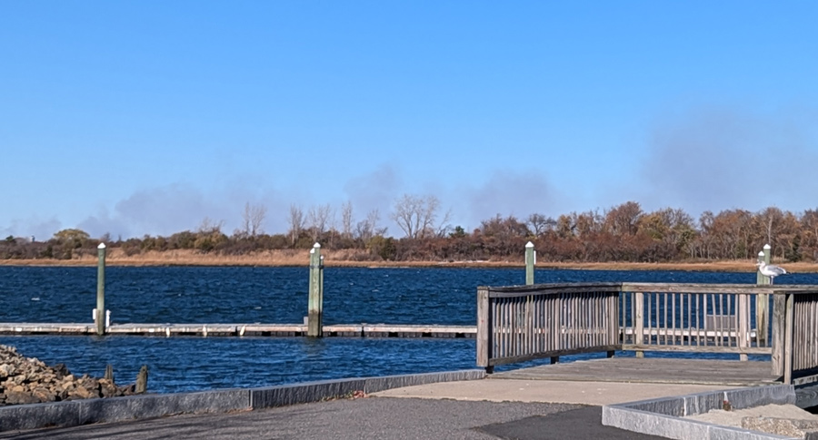 Smoke over the water as seen from Point Norfolk