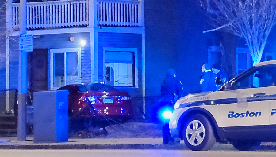 Car up on front steps of house at Washington and Wellesmere