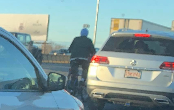 Bicyclist on the Southeast Expressway