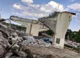 Crumbling Casey Overpass continues to come down