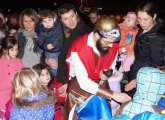 Judah Maccabbee hands out dreidels in Brookline