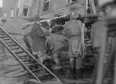 Firefighters knee deep in molasses in Boston