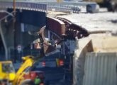 Taking down girders at the Casey Overpass in Forest Hills