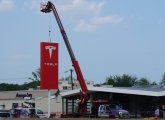 Tesla sign on Providence Highway in Dedham