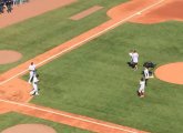 Jeff Bauman throwing first pitch to David Ortiz at Fenway Park