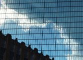 Clouds reflected in Boston's John Hancock Building after a downpour