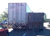 Two trucks stuck on ramp to I-495