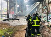 Boston firefighters in old mill building