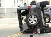 Flipped SUV at L and East 6th streets in South Boston