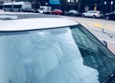 Busted windshield on Washington Street in the South End