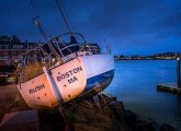 Boat on dry land after storm