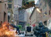 Free Guy scene set on Franklin Street, with flames, helicopters and missiles