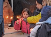 Menorah lighting in Adams Park in Roslindale Square