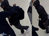 Wanted suspect in a hoodie, with backpack