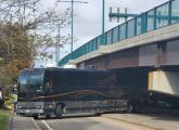 Bus stuck under Neponset River bridge in Quincy