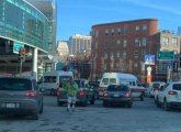 Guy directing traffic at Charles Circle