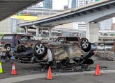 Car turned turtle under the Zakim Bridge