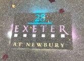 Stenciled ad for 28 Exeter