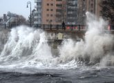 Waves slam into Lynn seawall