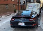 Dunks license plate on a Porsche on Beacon Hill