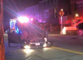 Car flipped on Poplar Street in Roslindale