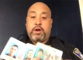 Det. Eddie Hernandez with fake Massachusetts licenses from Applebee's