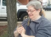 Woman with baby rabbit in Allston