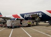 Plane with masks being unloaded